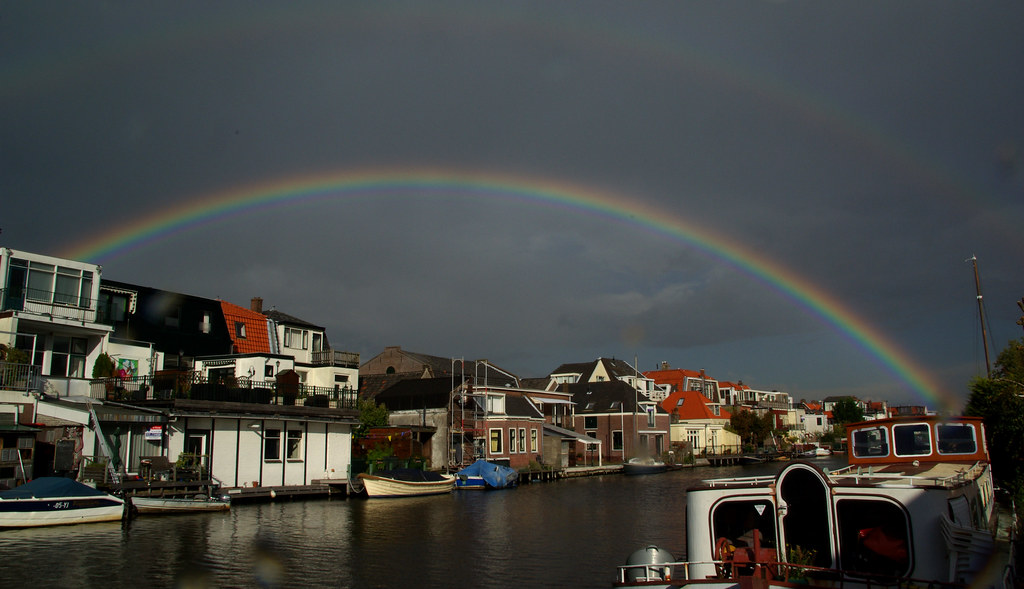 Doppio arcobaleno sopra laguna